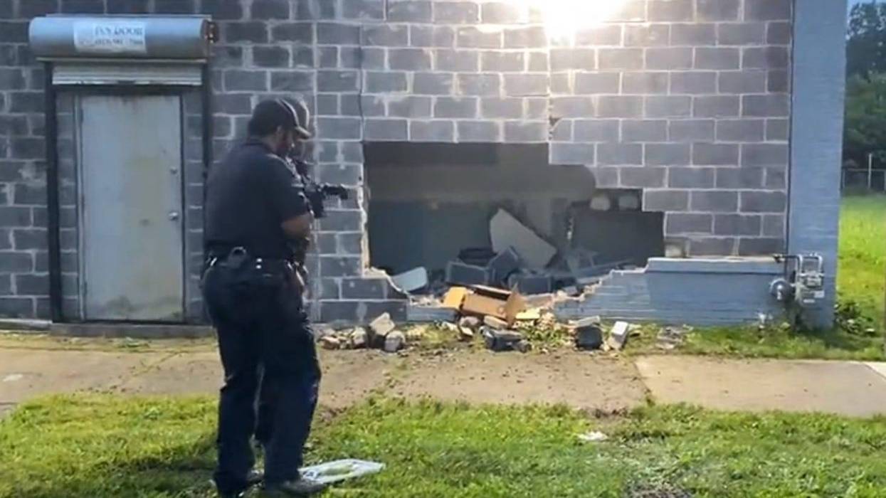 There's a big hole in the side of a building on Detroit's east side that appears was being used as an illegal marijuana grow operation.