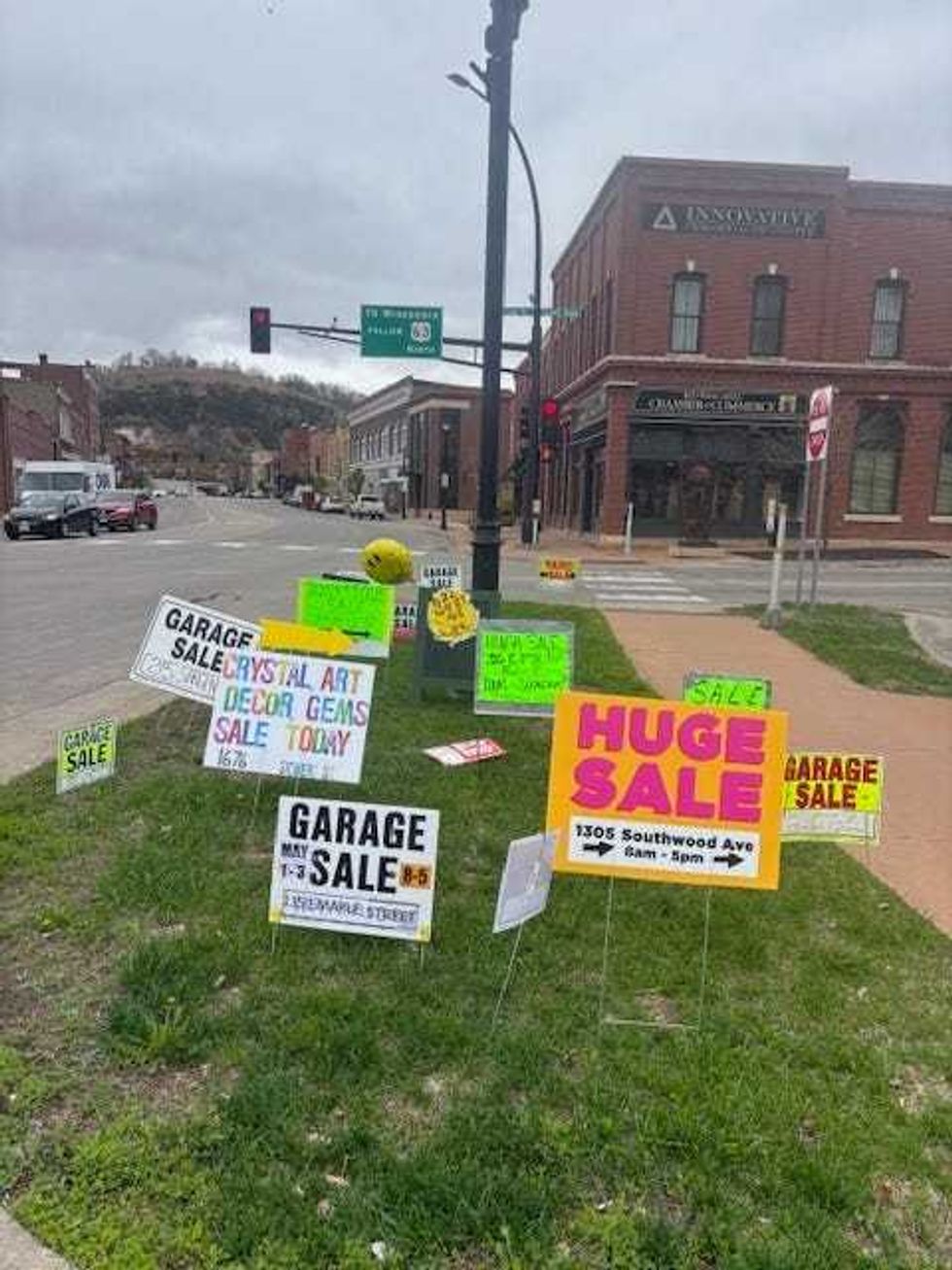 There were no shortage of signs or stuff the annual 100 Mile Garage Sale along both sides of the Mississippi River border between Minnesota and Wisconsin.