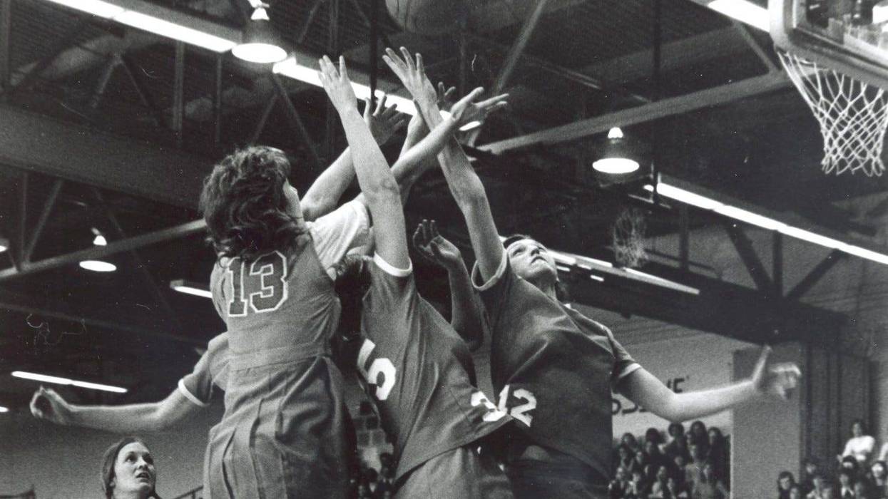 Theresa Shank Grentz (right, #12) on the court for Immaculata University.