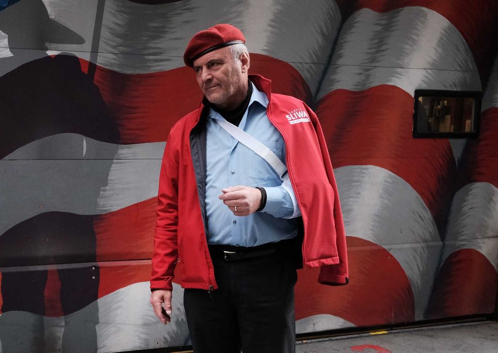 They-mayoral candidate Curtis Sliwa speaks to the media in front of an FDNY firehouse on November 01, 2021 in New York City