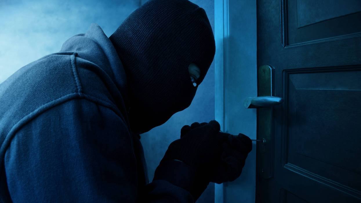 Thief picking a lock
