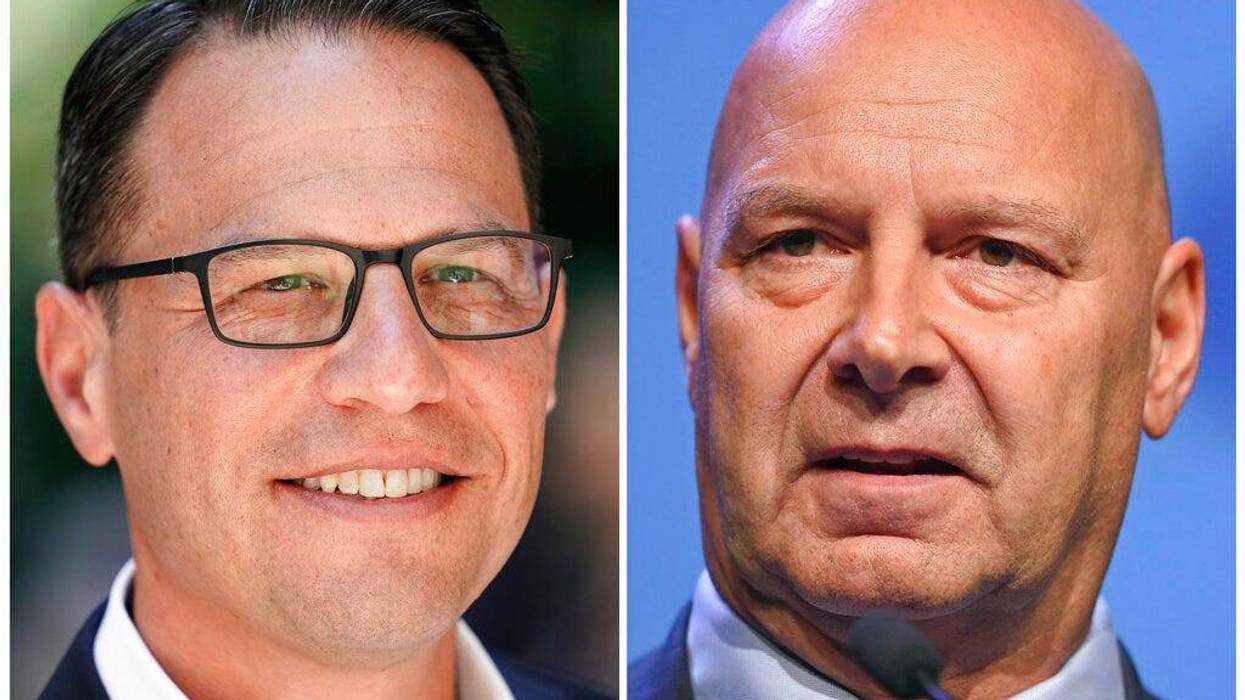 This combination of photos shows Pennsylvania Democratic gubernatorial candidate state Attorney General Josh Shapiro on June 29, 2022, in Philadelphia, left, and Pennsylvania Republican gubernatorial candidate Doug Mastriano on Sept. 29, 2022, in Erie, Pa., right. (AP Photo)