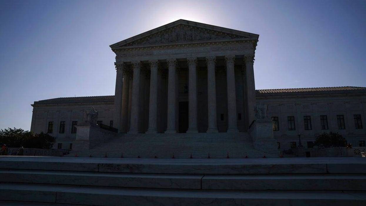 This June 29, 2021, file photo shows the U.S. Supreme Court on Capitol Hill in Washington. The Supreme Court is wrapping up its first all-virtual term, with decisions expected in a key case on voting rights and another involving information California requires charities to provide about donors.