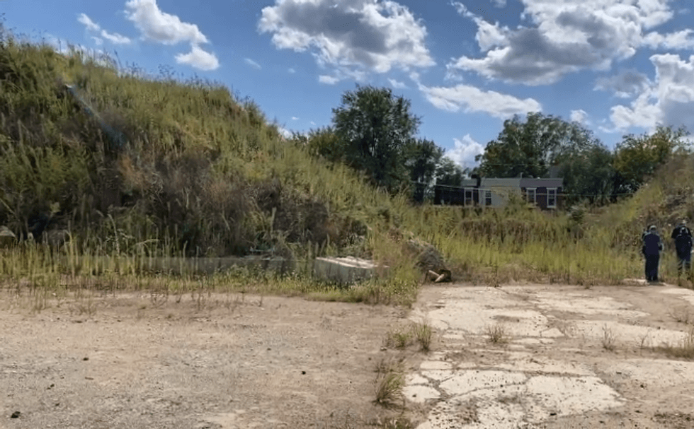 This massive mound of dirt and trash has been a nuisance to tis neighborhood for at least five years.