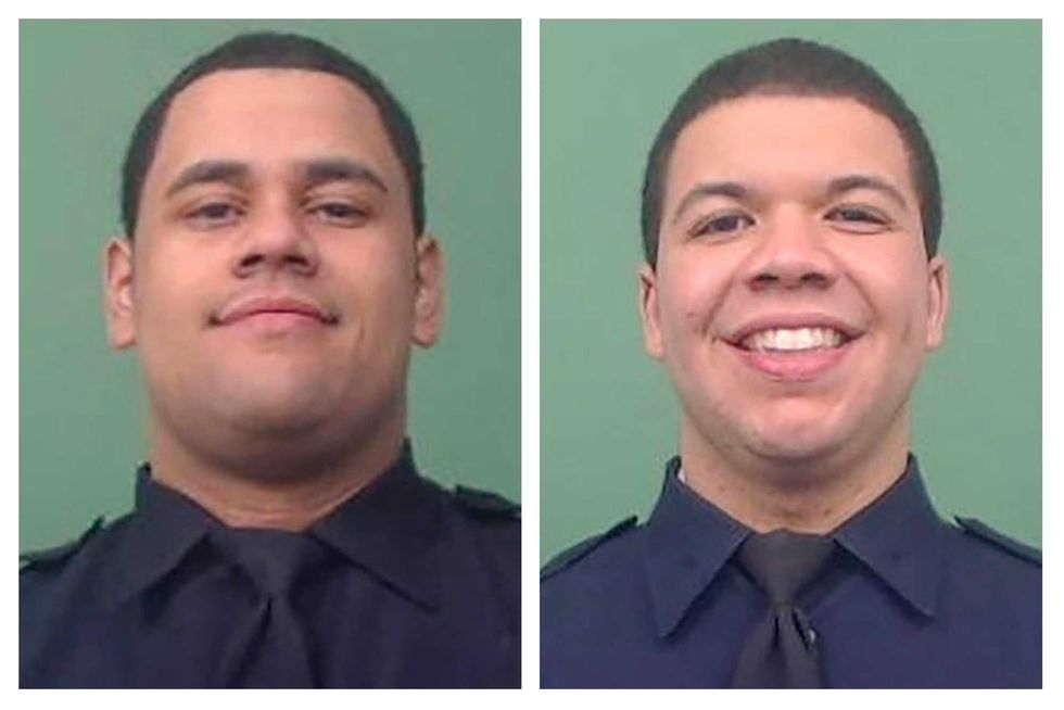 This photo combo of images provided by the New York City Police Department shows NYPD Officers Wilbert Mora, left, and Jason Rivera