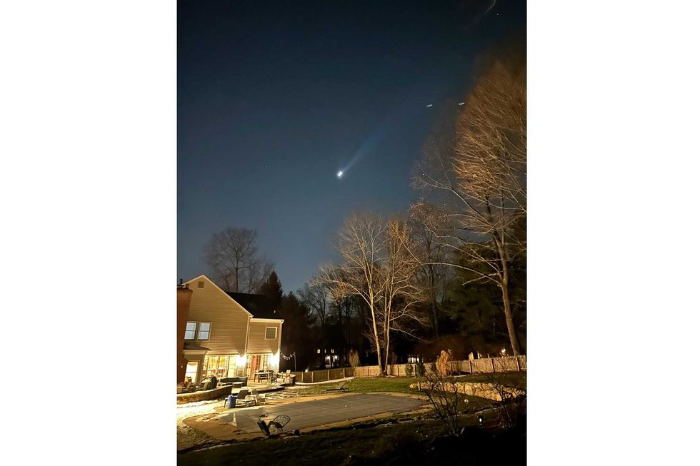 This photo provided by Brian Glenn shows what appears to be multiple drones flying over Bernardsville, N.J., on Thursday, Dec. 5, 2024