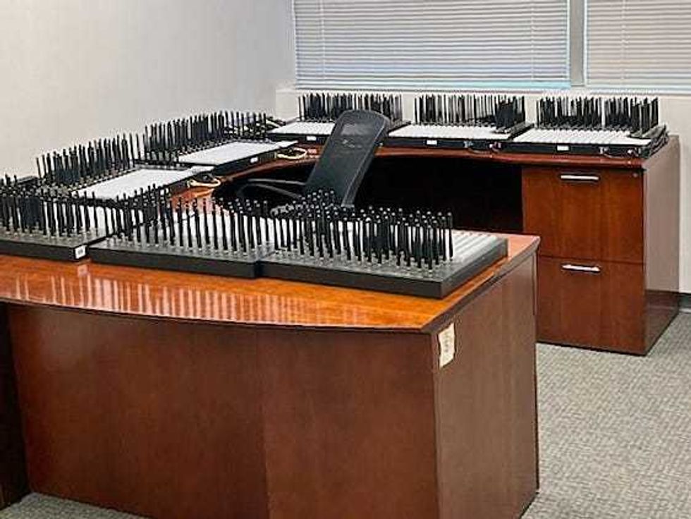 This photo provided by the U.S. Secret Service, in New York, Monday, Sept. 22, 2025, shows servers on desks at the location where they were seized by the agency