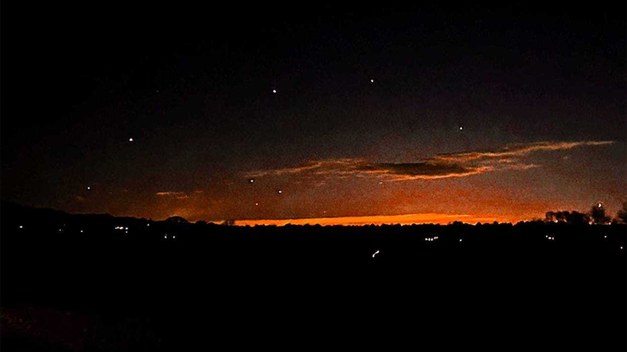 This photo provided by Trisha Bushey shows the evening sky and points of light near in Lebanon Township, N.J., on Thursday, Dec. 5, 2024