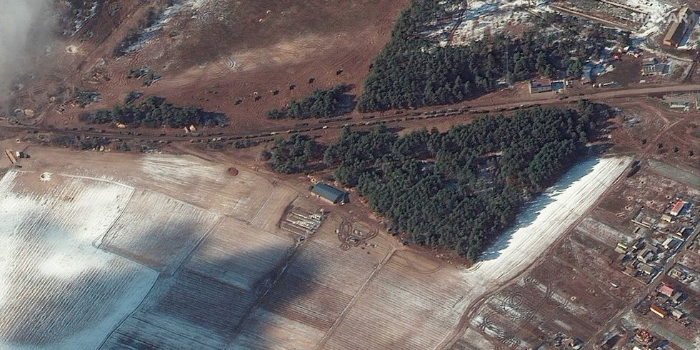 This satellite image provided by Maxar Technologies shows resupply trucks and multiple probable rocket launchers in firing position, in Berestyanka, Ukraine, during the Russian invasion, Wednesday, March 9, 2022