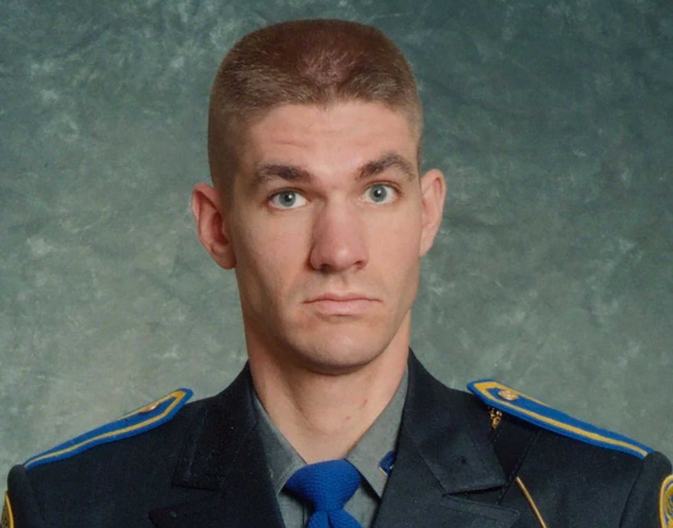 This undated photo provided by the Connecticut State Police shows Sgt. Brian Mohl, a 26-year veteran of their Woodbury department