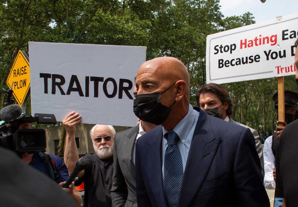 Thomas Barrack (R), a close adviser to former President Donald Trump and chair of his inaugural committee, leaves after attending a hearing at the US District Court of Eastern District of New York on July 26, 2021 in New York City. - Thomas Barrack, a close ally to former US president Donald Trump and one of his top fundraisers, was arrested and charged on July 20, 2021 with not disclosing his lobbying on behalf of a foreign government. Barrack, a private equity investor and longtime Trump friend who chaired Trump