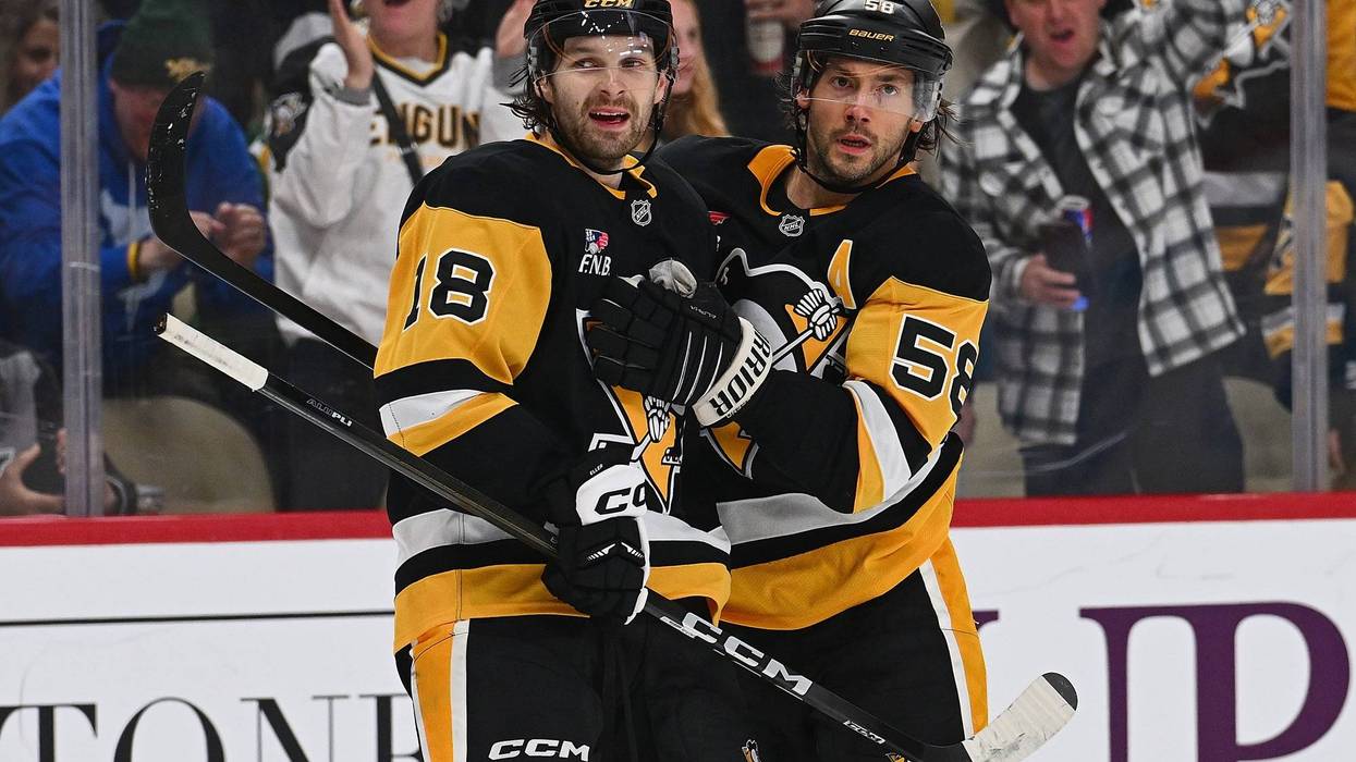 Thomas Novak celebrates with Kris Letang