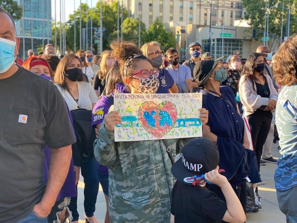 Thousands gather outside San Jose City Hall to mourn the nine lives lost at Wednesday