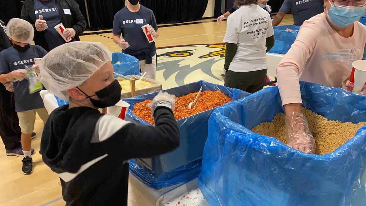 Thousands of volunteers gathered at an East Bay church to make meal preps for the homeless.