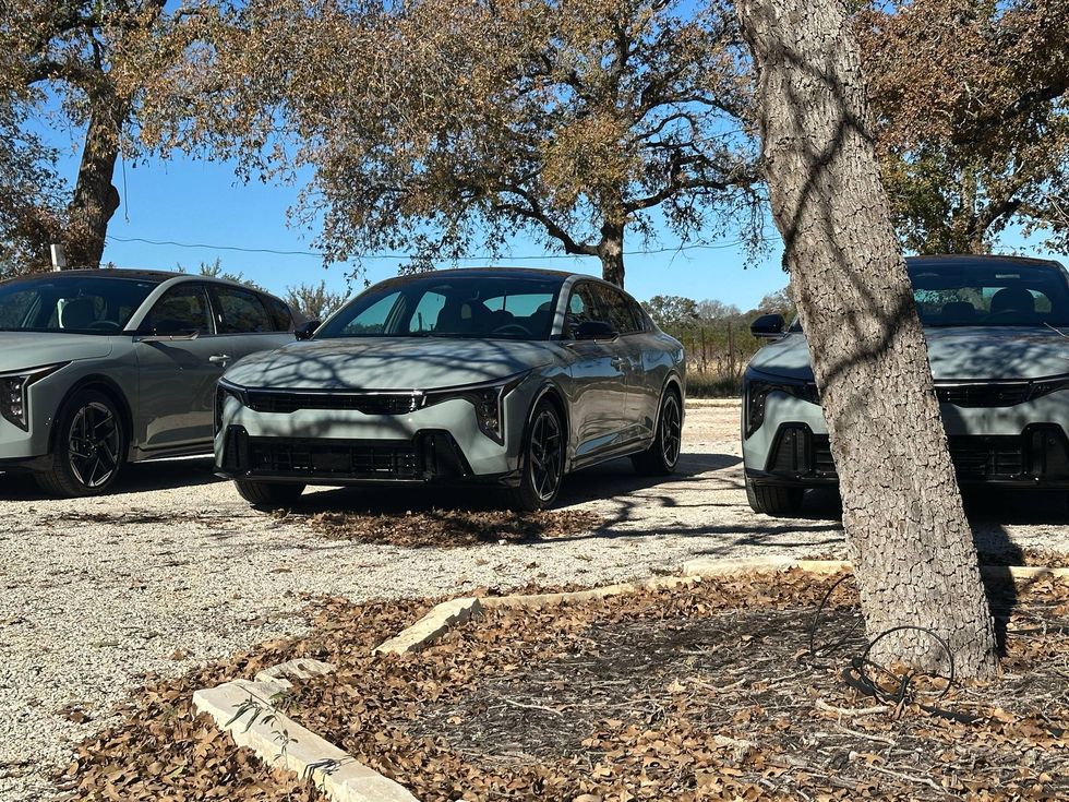 Three 2025 Kia K4 parked neatly
