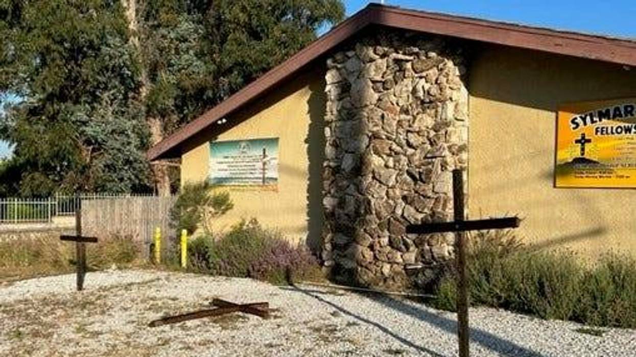 three crosses outside church