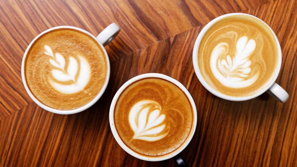 Three cups of coffee stock photo.