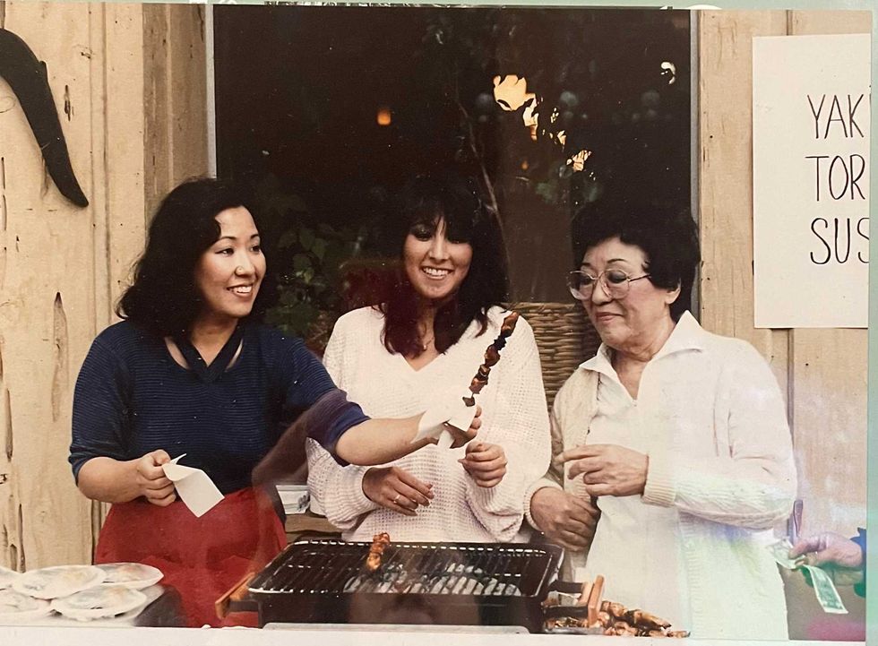 Three generations of owners of Kamehachi (left to right: Sharon Perazzoli, Giulia Sindler and Marion Konishi) outside its original location at 1617 N. Wells Street in Chicago.