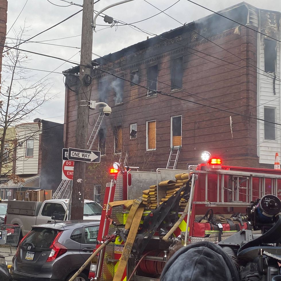 Three row homes on fire at Tasker and Franklin streets
