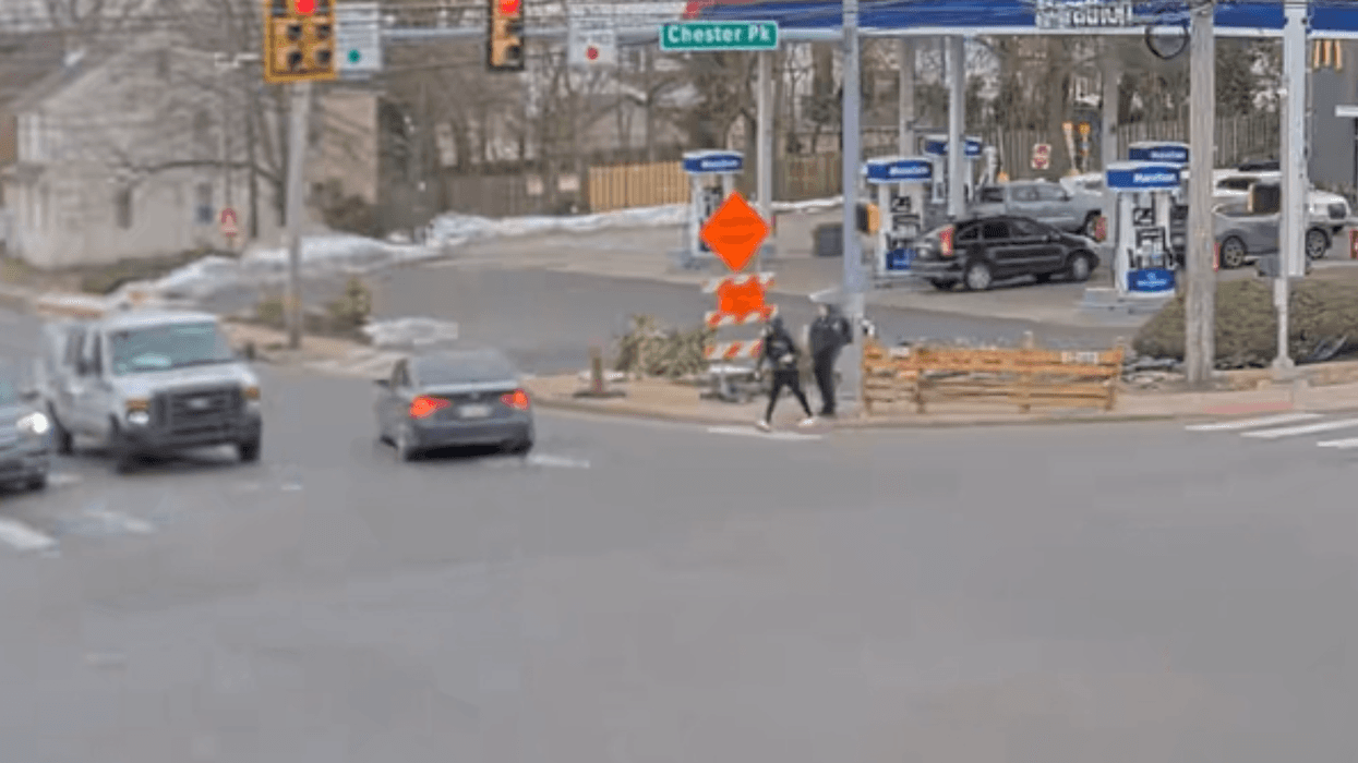 Three teens at the corner of Chester Pike and Lincoln Avenue in Prospect Park throw a snowball at a passing car on March 2