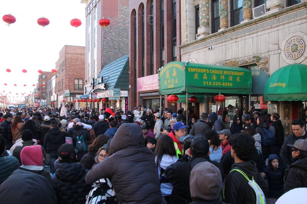 Throngs of people descended upon Chinatown streets and businesses on Sunday for the annual Lunar New Year parade and celebration.