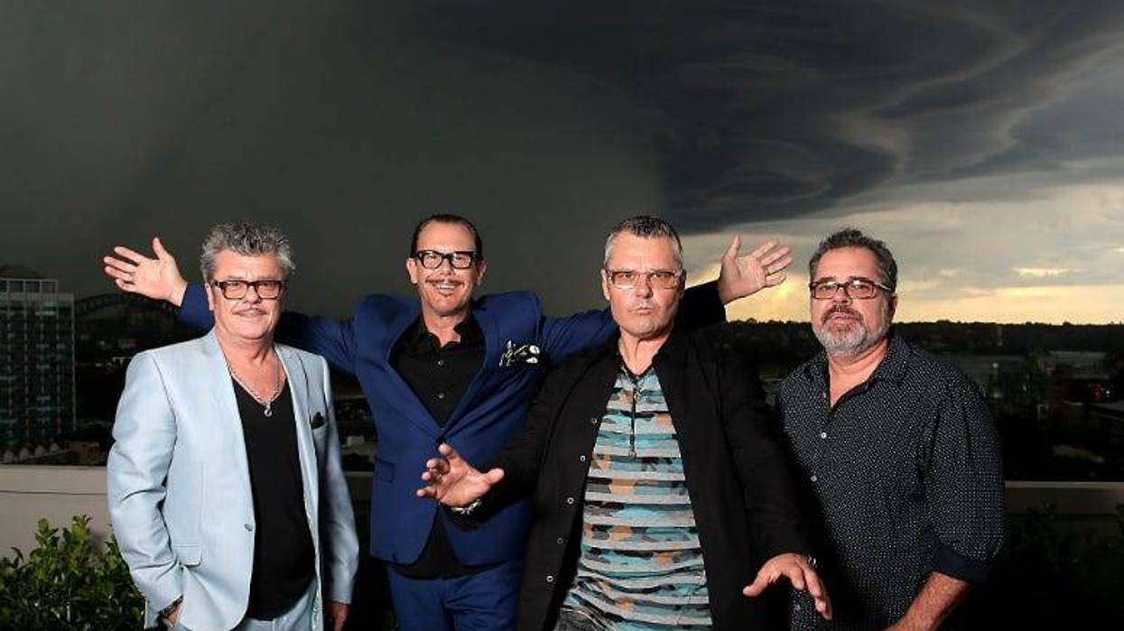 Tim Farriss, Kirk Pengilly, Jon Farriss and Andrew Farriss of INXS pose at the special Quadruple Platinum plaque presentation