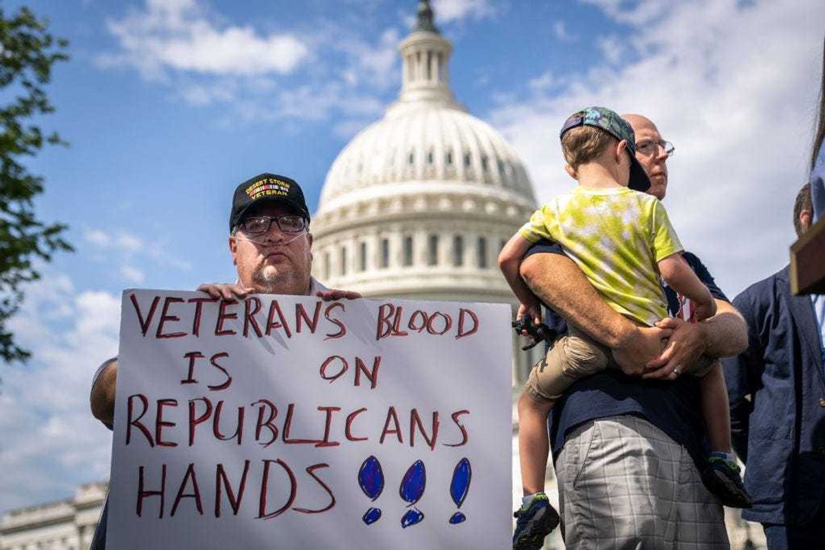 Tim Houser, a Desert Storm veteran from Twinsburg, Ohio, attends a news conference with veterans and Senate Democrats about the Honoring Our Promise to Address Comprehensive Toxics (PACT) Act on Capitol Hill July 28, 2022 in Washington, DC. A procedural vote to advance the bill, which would expand health care access for military veterans who became ill after being exposed to toxic burn pits, failed to pass in the Senate on Wednesday. (Photo by Drew Angerer/Getty Images)