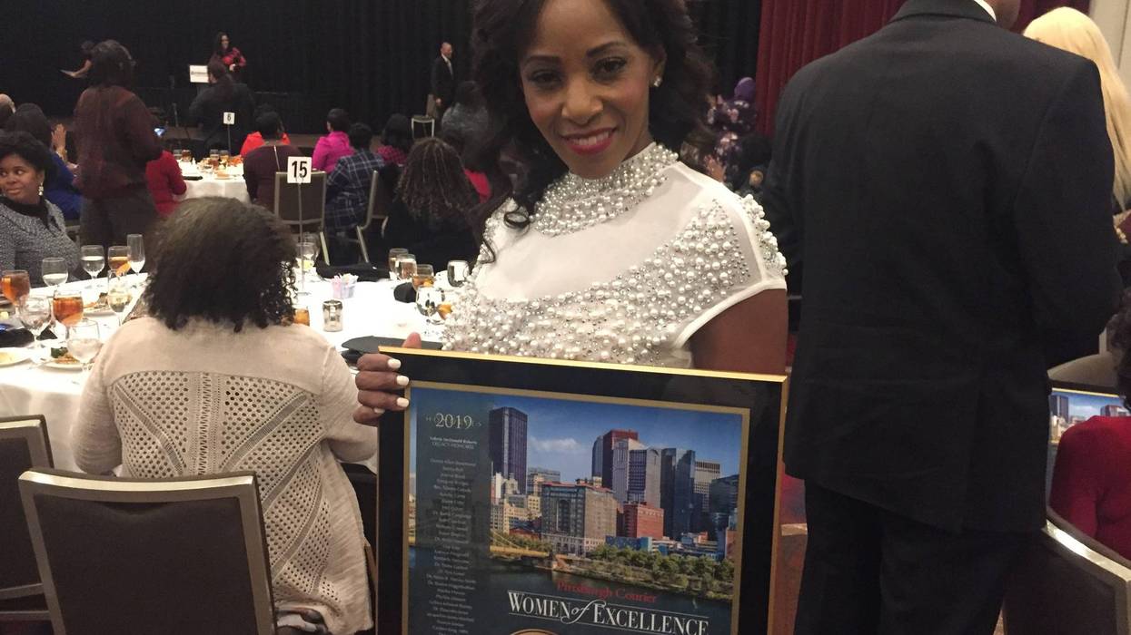 Timira Rush with her Women of Excellence Award