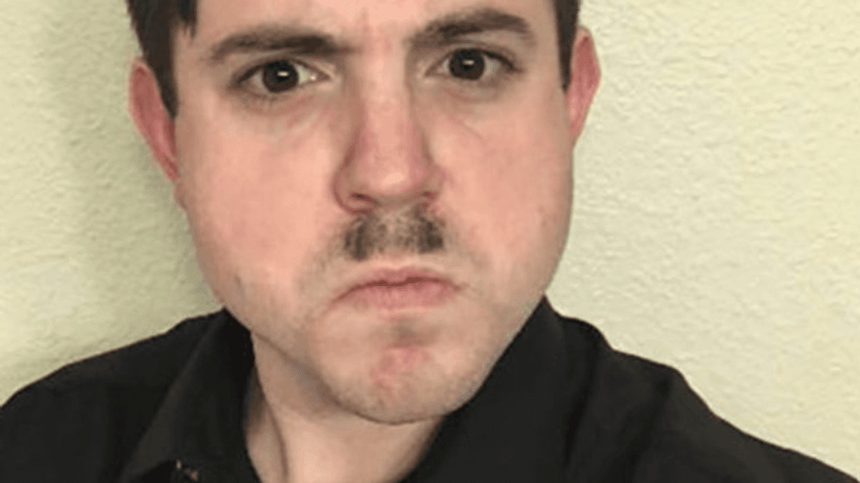 Timothy Louis Hale-Cusanelli pretending to be Hitler.
