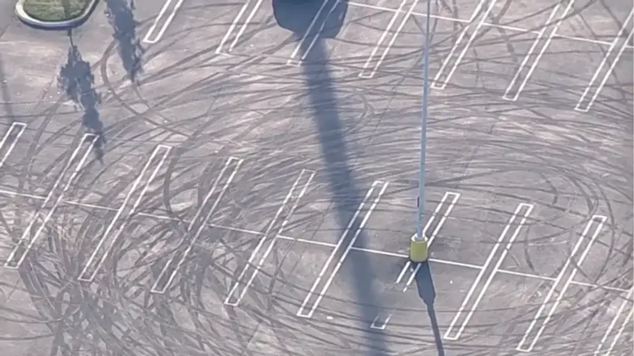 Tire tracks left in a parking lot after an illegal car meet-up in Northeast Philadelphia on June 2, 2024.