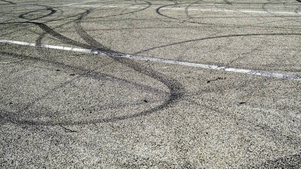 tire tracks on asphalt