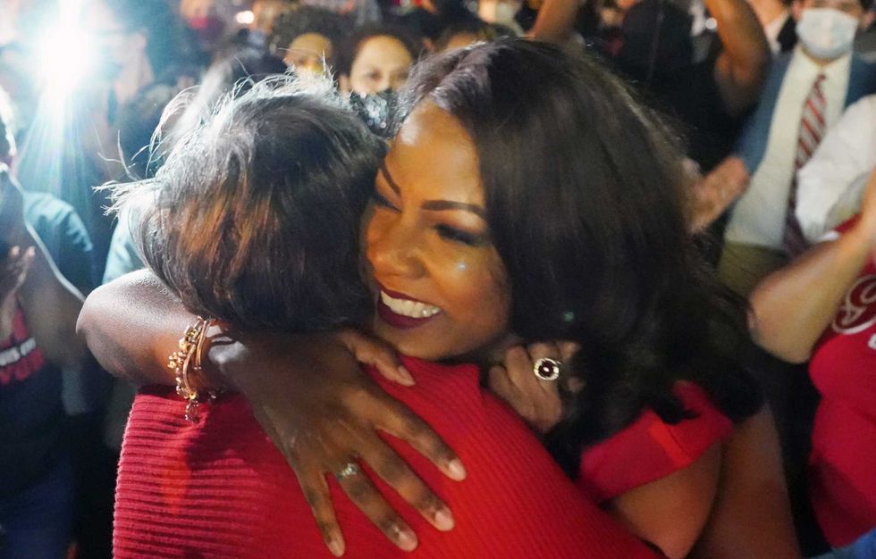 Tishaura Jones hugs a supporter at a watch party after clinching the win as St. Louis Mayor, in St. Louis on April 6, 2021. Jones, the current City Treasurer, makes history by becoming the first Black woman to become St. Louis Mayor. (Photo by Bill Greenblatt/UPI)