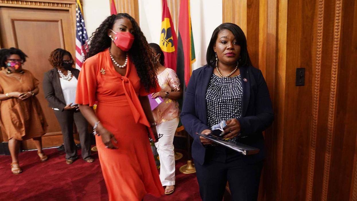 Tishaura Jones leaves a press conference.