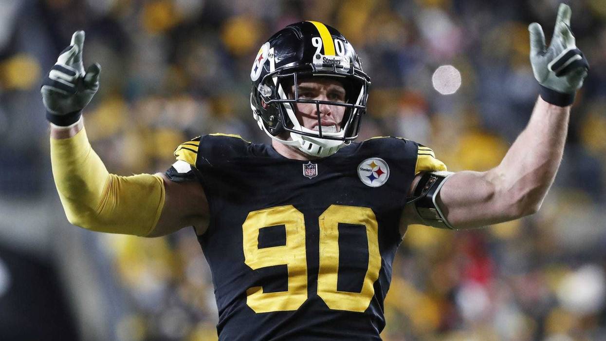 TJ Watt with arms up