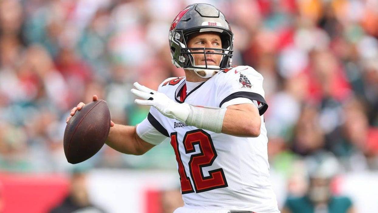 Tom Brady #12 of the Tampa Bay Buccaneers throws a pass against the Philadelphia Eagles in the first half of the NFC Wild Card Playoff game at Raymond James Stadium on Jan. 16, 2022 in Tampa, Florida.