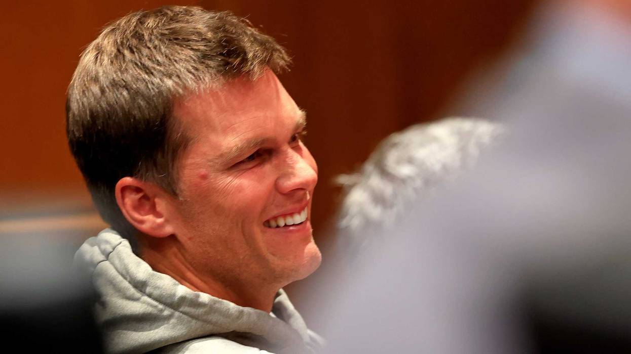 Tom Brady, quarterback for the Tampa Bay Buccaneers looks on during a press conference for new head coach Todd Bowles at AdventHealth Training Center on March 31, 2022 in Tampa, Florida