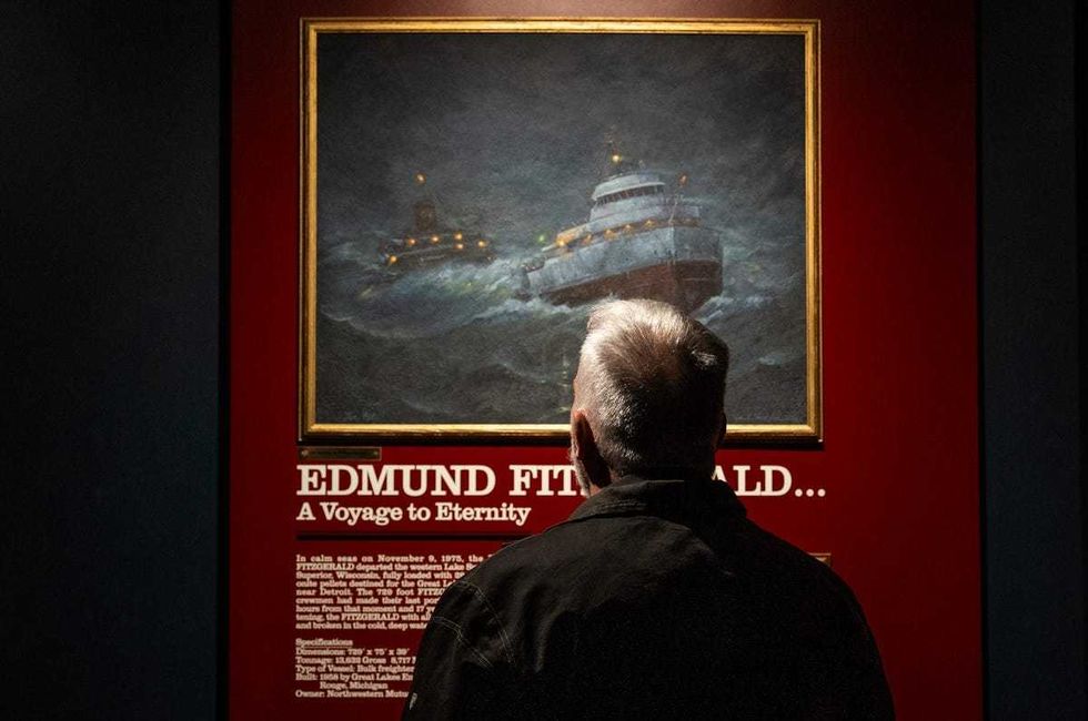 Tom Burns, of Leopolis, Wisconsin, looks over an exhibit for the Edmund Fitzgerald on display at the Great Lakes Shipwreck Museum at Whitefish Point in Paradise on Thursday, October 30, 2025.