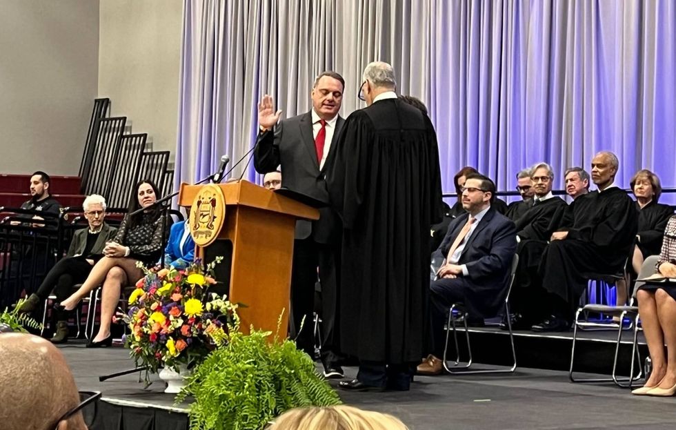 Tom DiBello is sworn onto the Montgomery County Board of Commissioners.