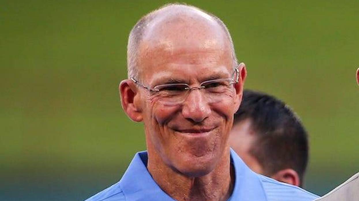 Tom Grieve poses for a photo with Michael Young and his Texas Rangers Baseball Hall of Fame plaque