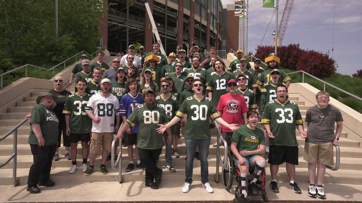 Tom Grossi and fans outside Lambeau Field in Green Bay