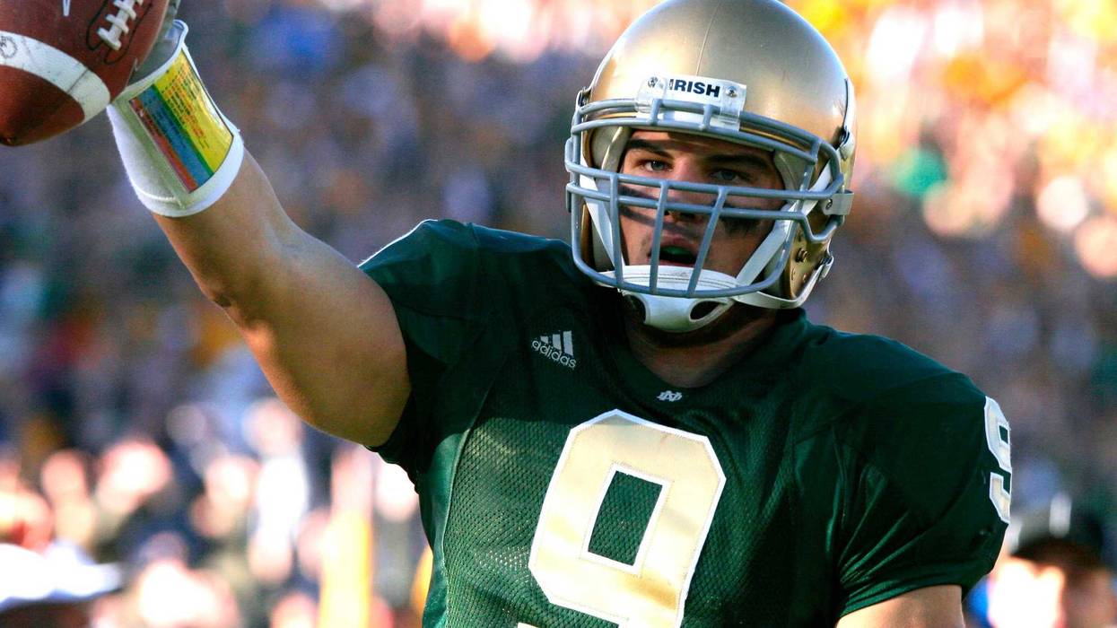 Tom Zbikowski (9) celebrates