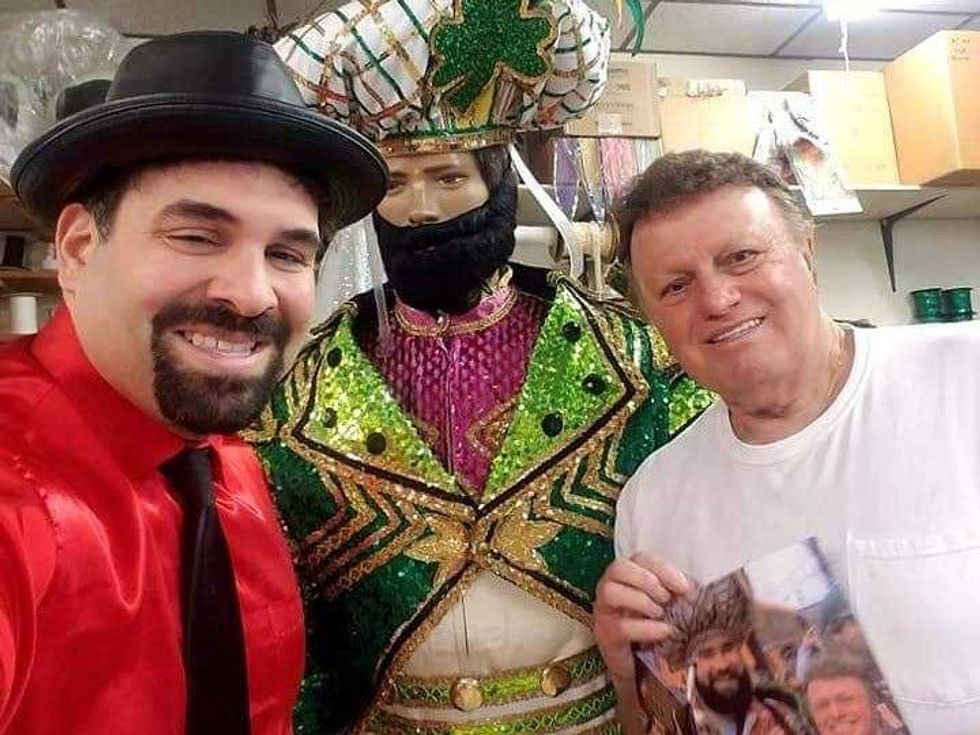Tony consults with costume designer James May (right).
