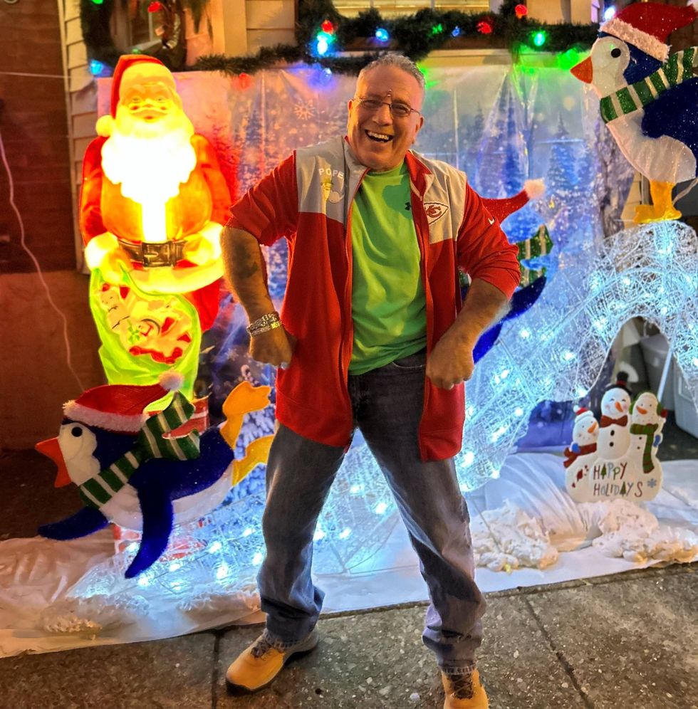 Tony, in front of his childhood home.