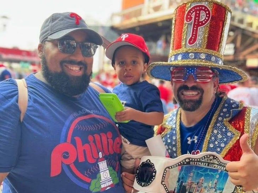 Tony (right) with co-worker Stu Robinson and his son.