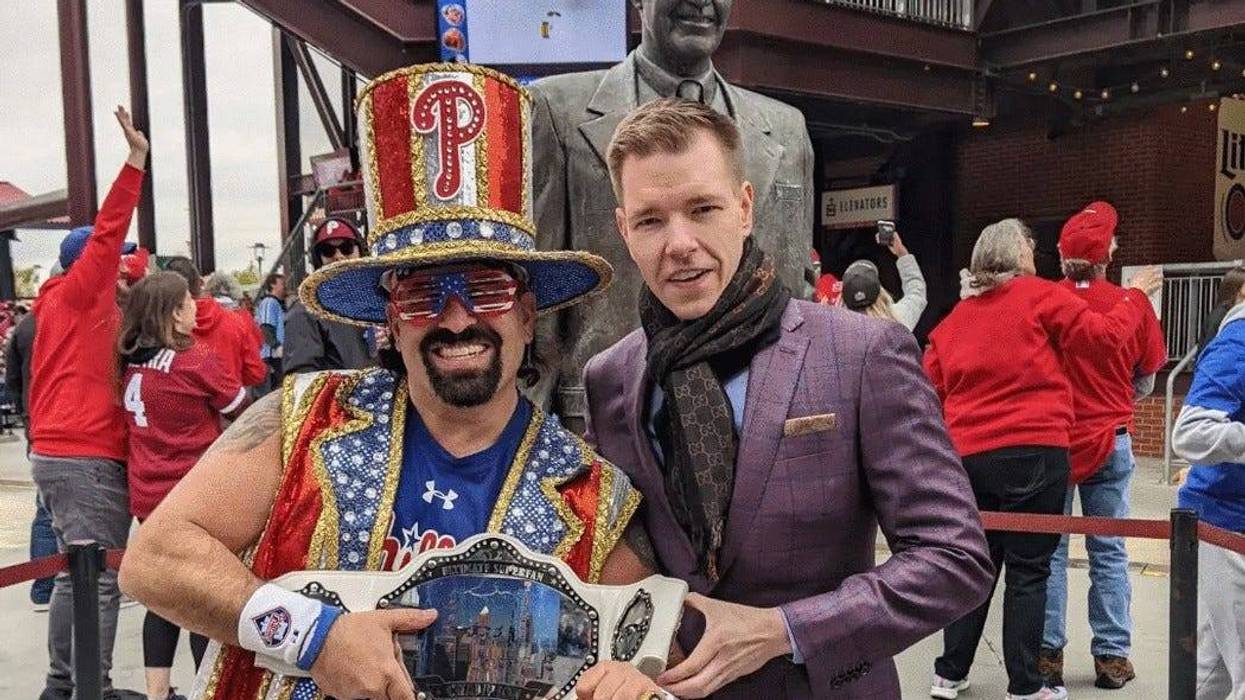 Tony "Tornado" Penecale (left) along with singer and broadcaster Kane Kalas at Citizens Bank Park, in front of the statue honoring Kalas' father, the late, legendary Phillies broadcaster Harry Kalas.