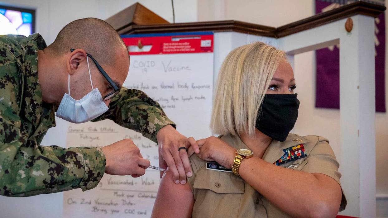 Top Defense Dept. official calls military's Covid effort 'phenomenal'