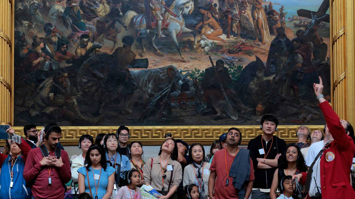 Tour guides lead guests through the history of the U.S. Capitol Rotunda on 9/30/25 in Washington, DC. If lawmakers fail to reach a bipartisan compromise the the federal government will shutdown at midnight, ending non-essential work possibly including tours of the Capitol building.