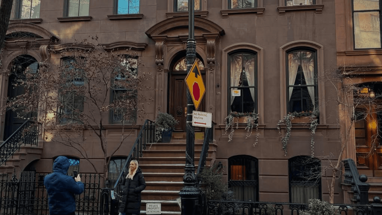 Tourists taking pictures in front of Carrie Bradshaw’s West Village apartment in HBO’s Sex and the City on Jan. 14, 2025.