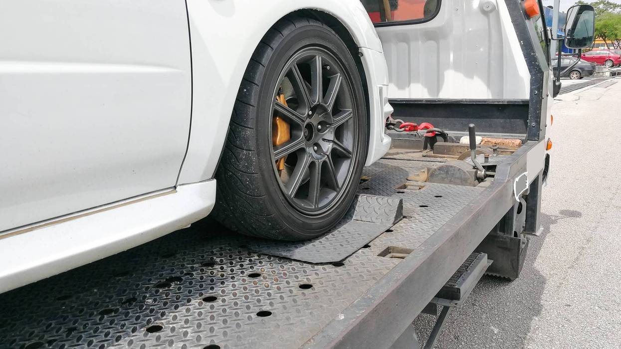 tow truck towing car