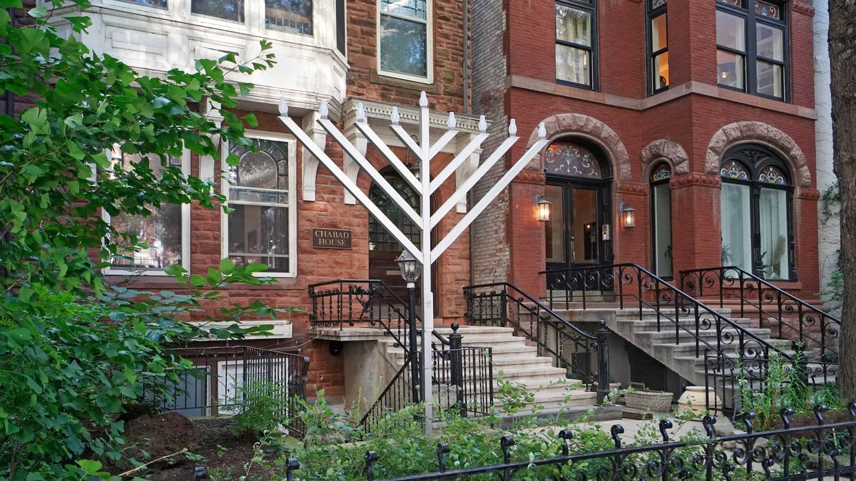 : Townhouse with outdoor Chanukah menorah in Chicago Old Town area - Chicago, USA - Aug. 30, 2022